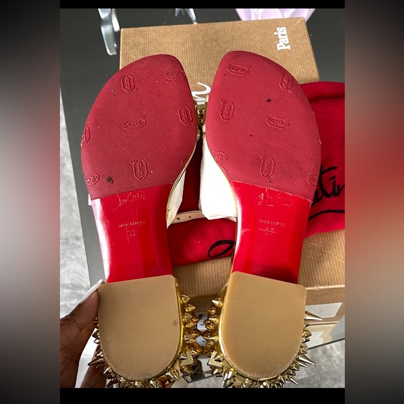Christian Louboutin
Druide Spiked Patent Flat Sandal